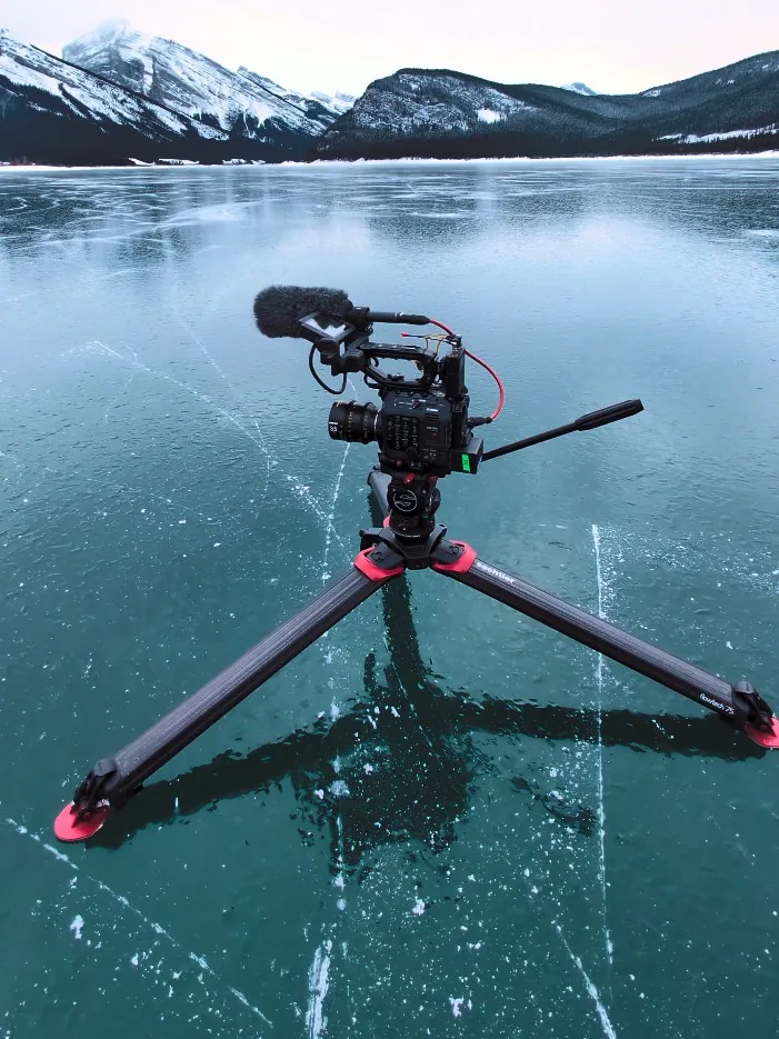 Canon C500 MKII on a Sachtler tripod on a frozen turquoise lake — Wild Ice shoot, Kananaskis