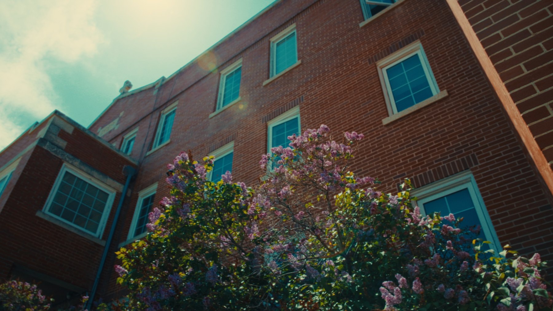 The Old Sun Community College brick building against the sky — Natosapi