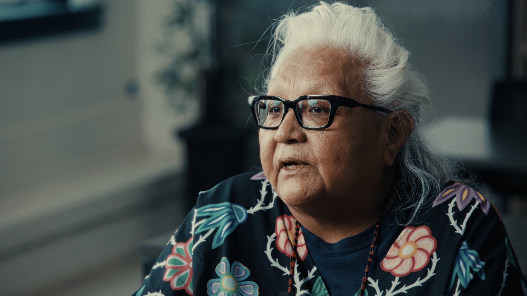 Documentary interview frame — Old Sun Community College, Natosapi