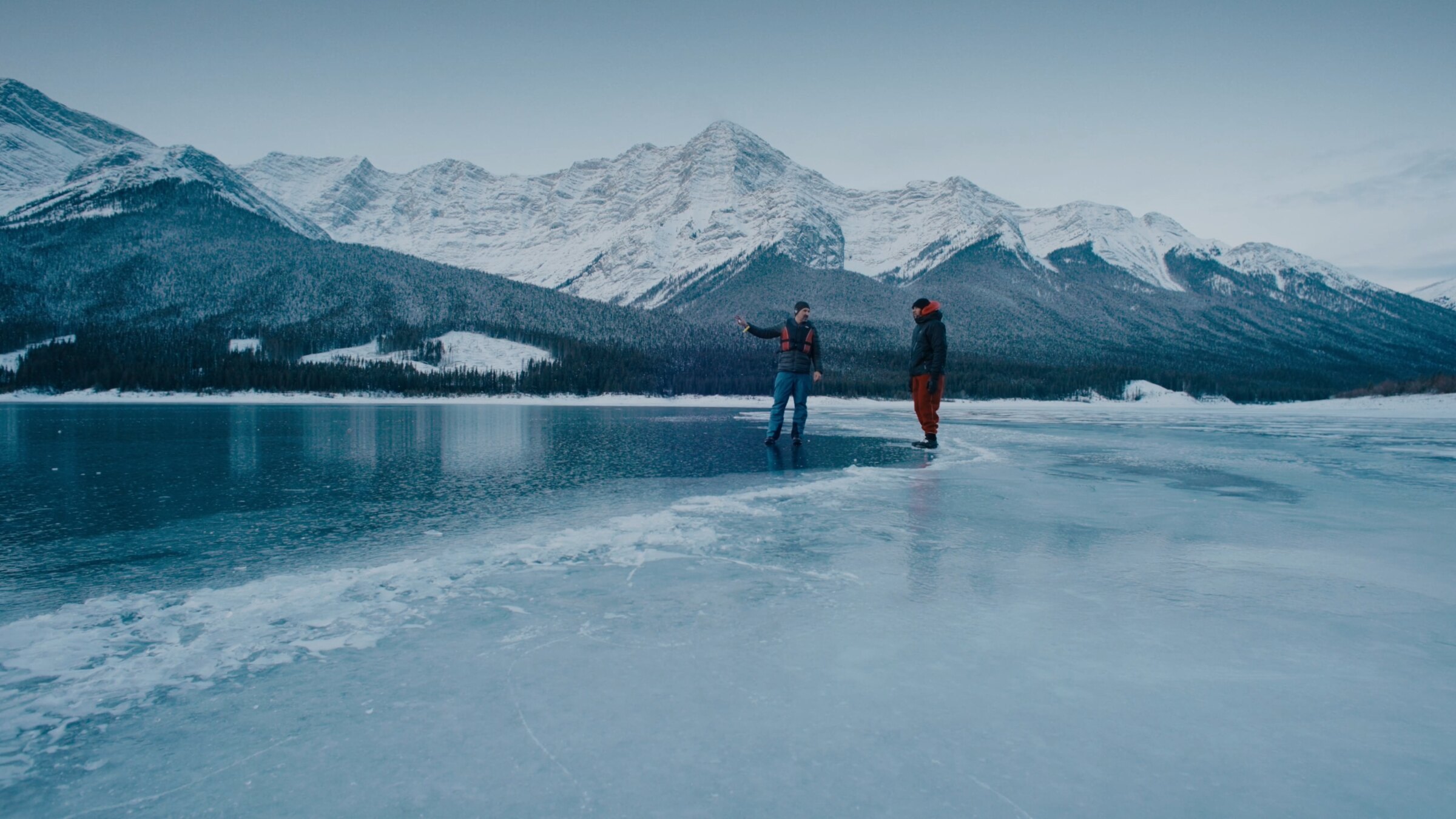 Two subjects standing on a frozen mountain lake — Wild Ice documentary interview, shot by DCFOTOFILM