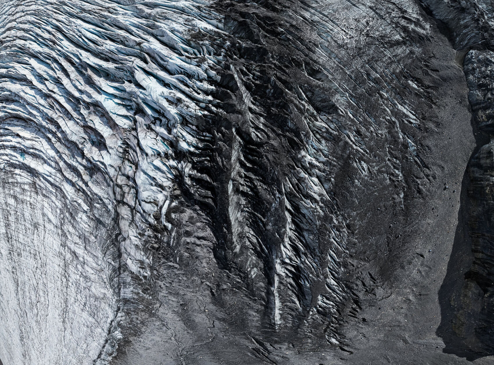 Abstract aerial fine art photograph of Athabasca Glacier crevasse textures, Jasper National Park, by Dave Copithorne and Jan Kabatoff