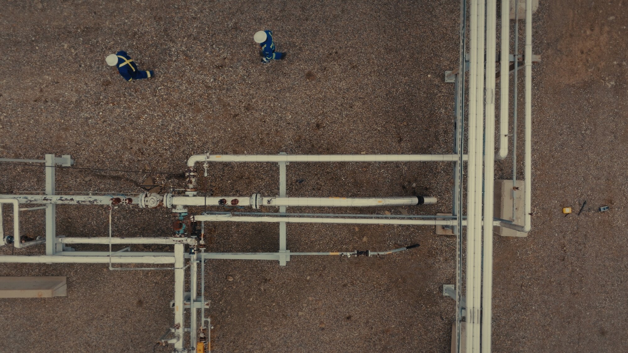 Top-down aerial of pipeline infrastructure at an Alberta facility