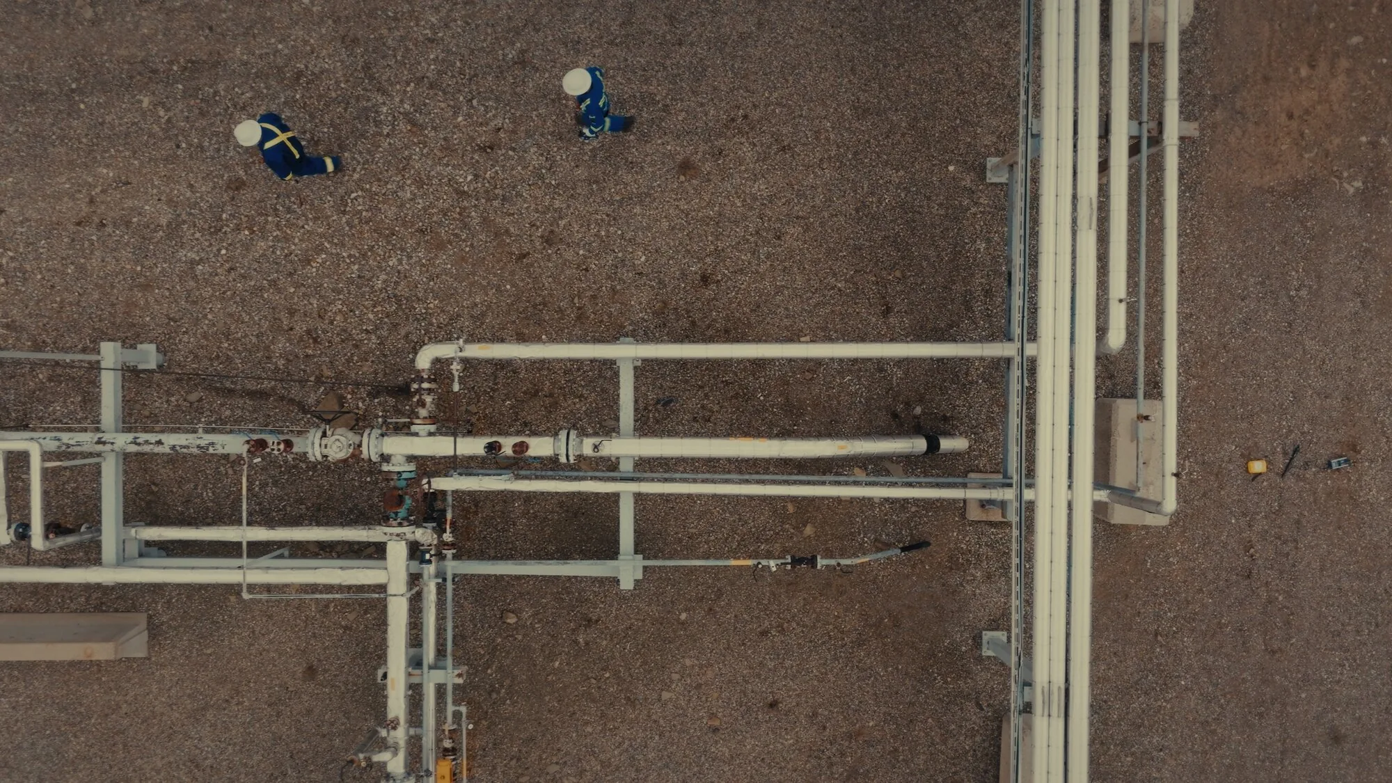 Top-down aerial of pipeline infrastructure at an Alberta facility