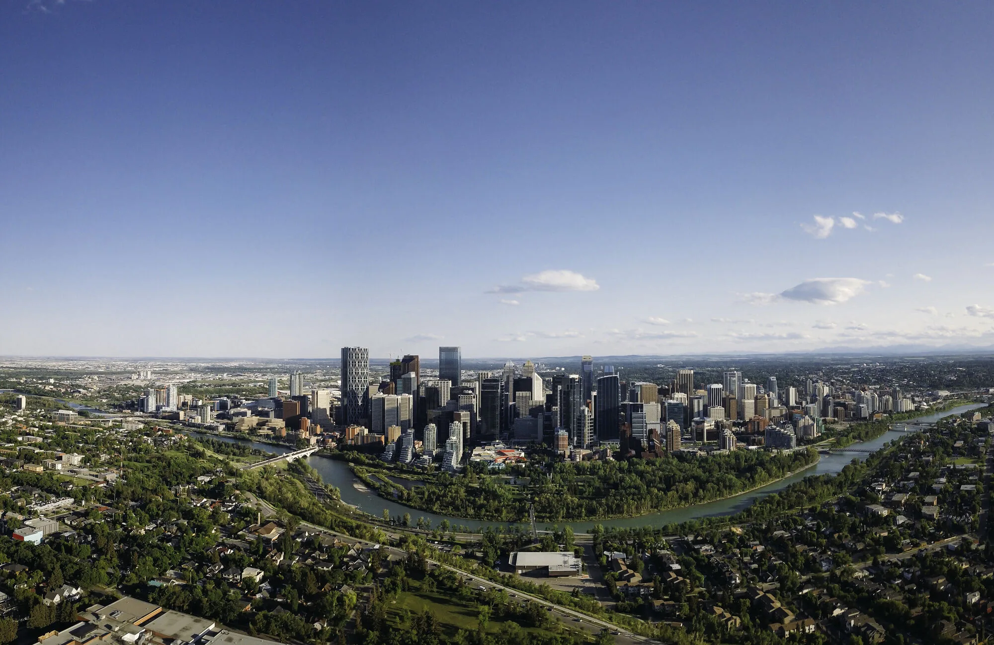 Aerial drone photo of the downtown Calgary skyline and Bow River — drone services Calgary by DCFOTOFILM