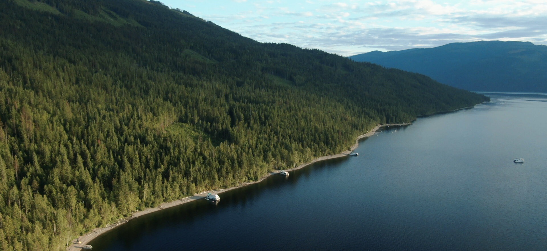 Golden sunset over a lake from the air, aerial drone photo for tourism marketing