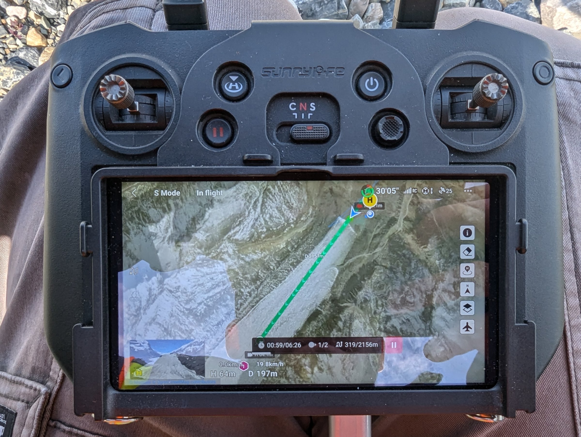 DJI drone controller screen showing GPS flight route over Athabasca Glacier — match cut coordinates, August 2024