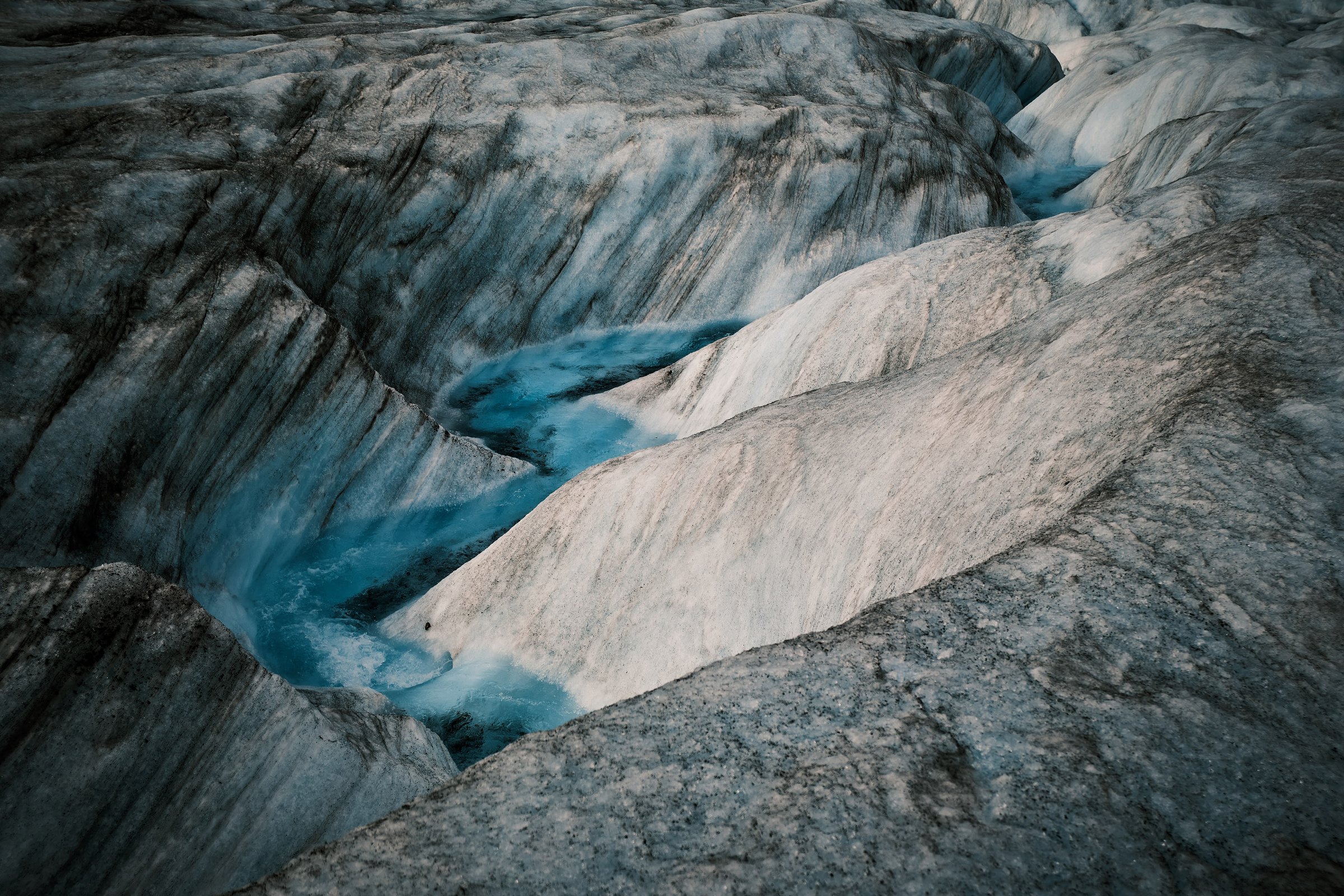 Cryoconite deposits in glacier crevasses — Athabasca Glacier aerial detail