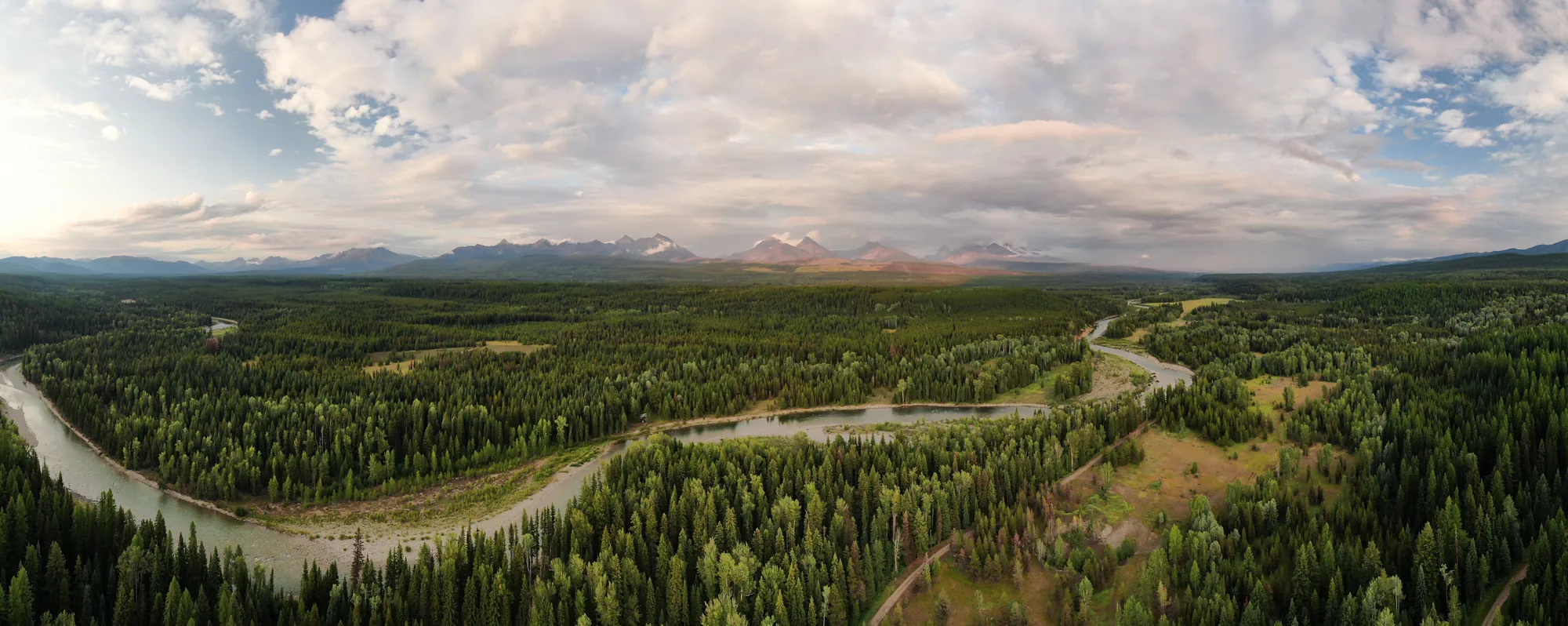 Panorama of the Flathead River winding through forest in the Flathead Valley, southeastern British Columbia