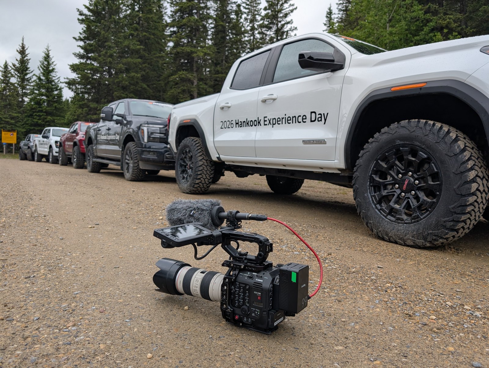 Canon C500 MKII camera rig on a gimbal on the trail with the convoy behind — Hankook MT2 shoot BTS