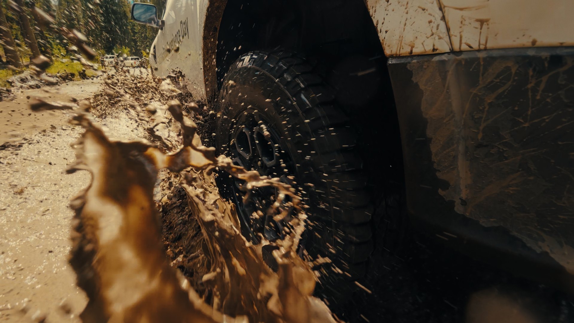 Hankook MT2 tire throwing a spray of mud droplets — rigged DJI Action 6 tire POV, 120fps