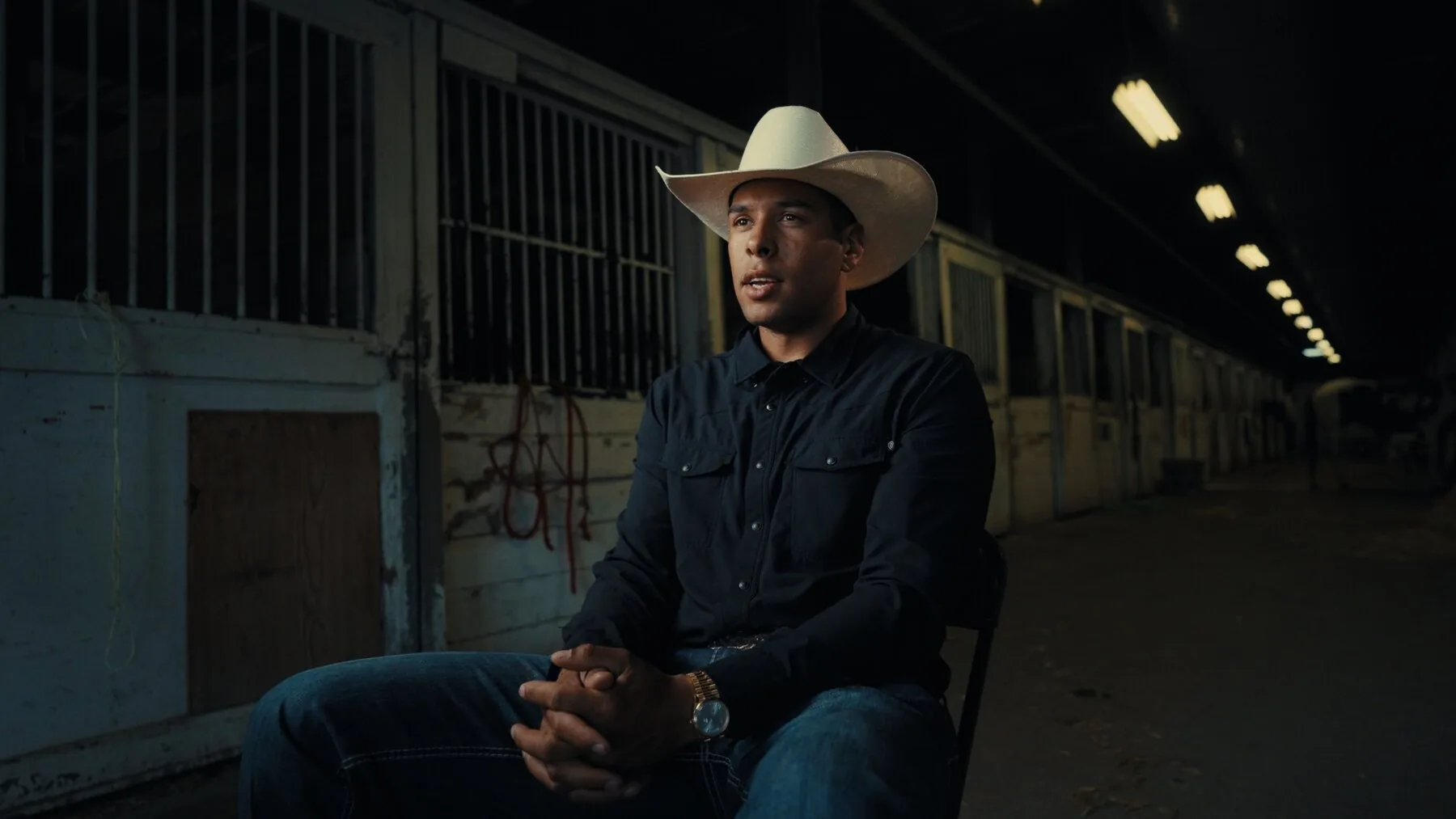 Shad Mayfield interview frame — wide in the barn alley