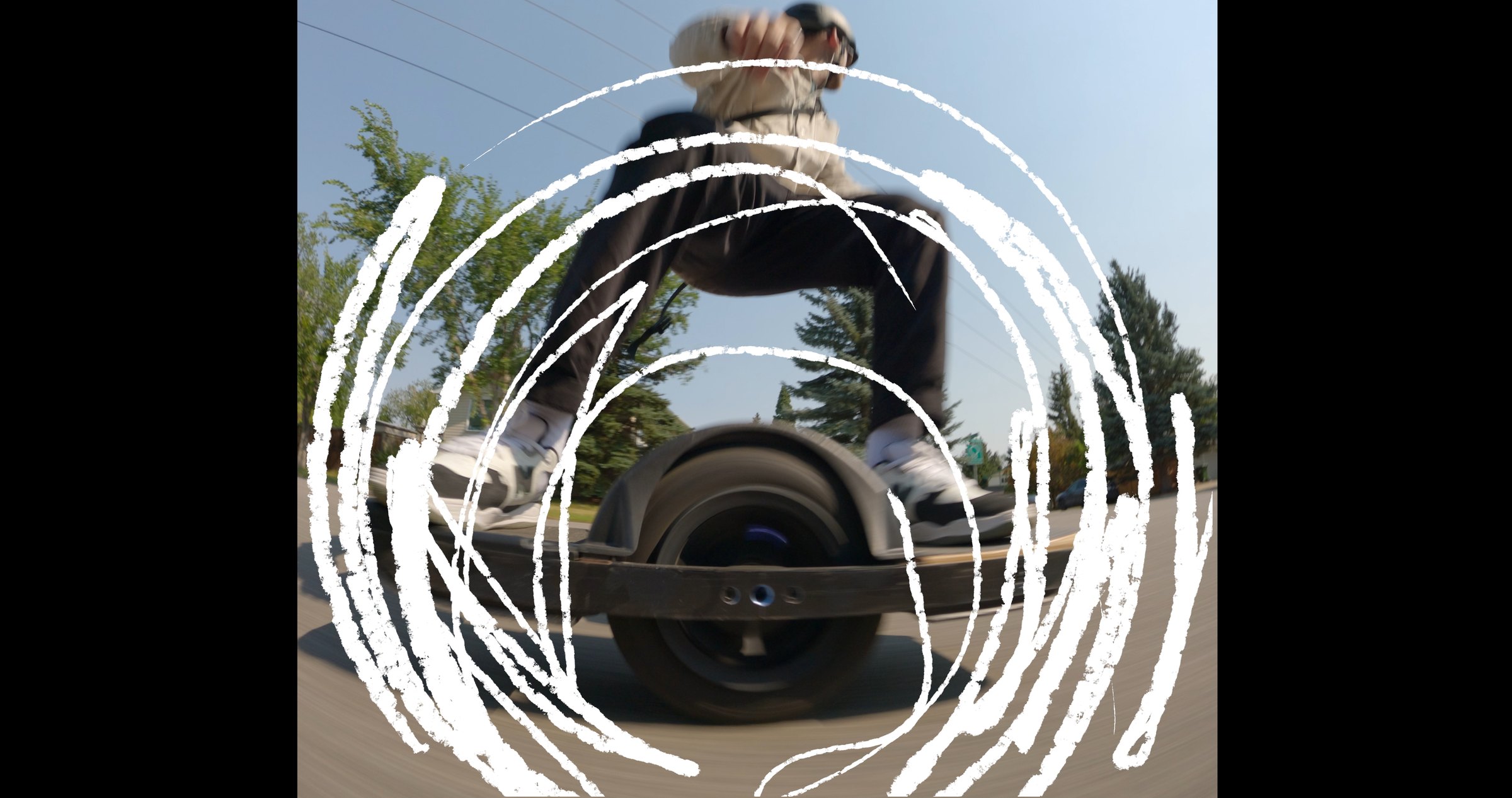 Onewheel commercial frame — motion graphics and illustrated world around the Onewheel