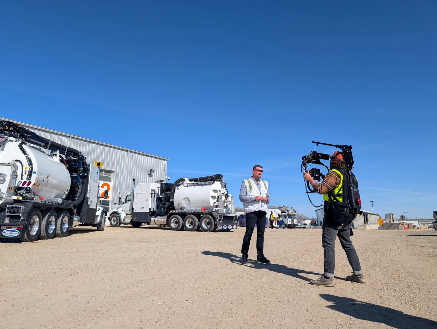 On-location industrial video shoot in Alberta with a DP and crew capturing an interview