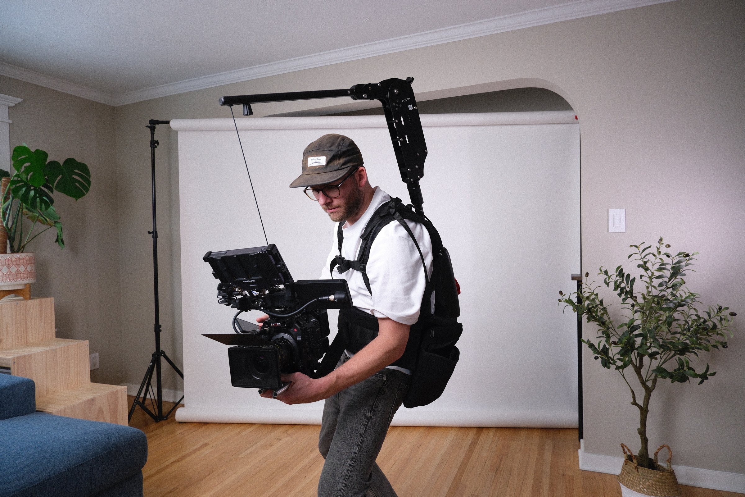 Calgary Director of Photography Dave Copithorne operating a Canon cinema camera on an Easyrig