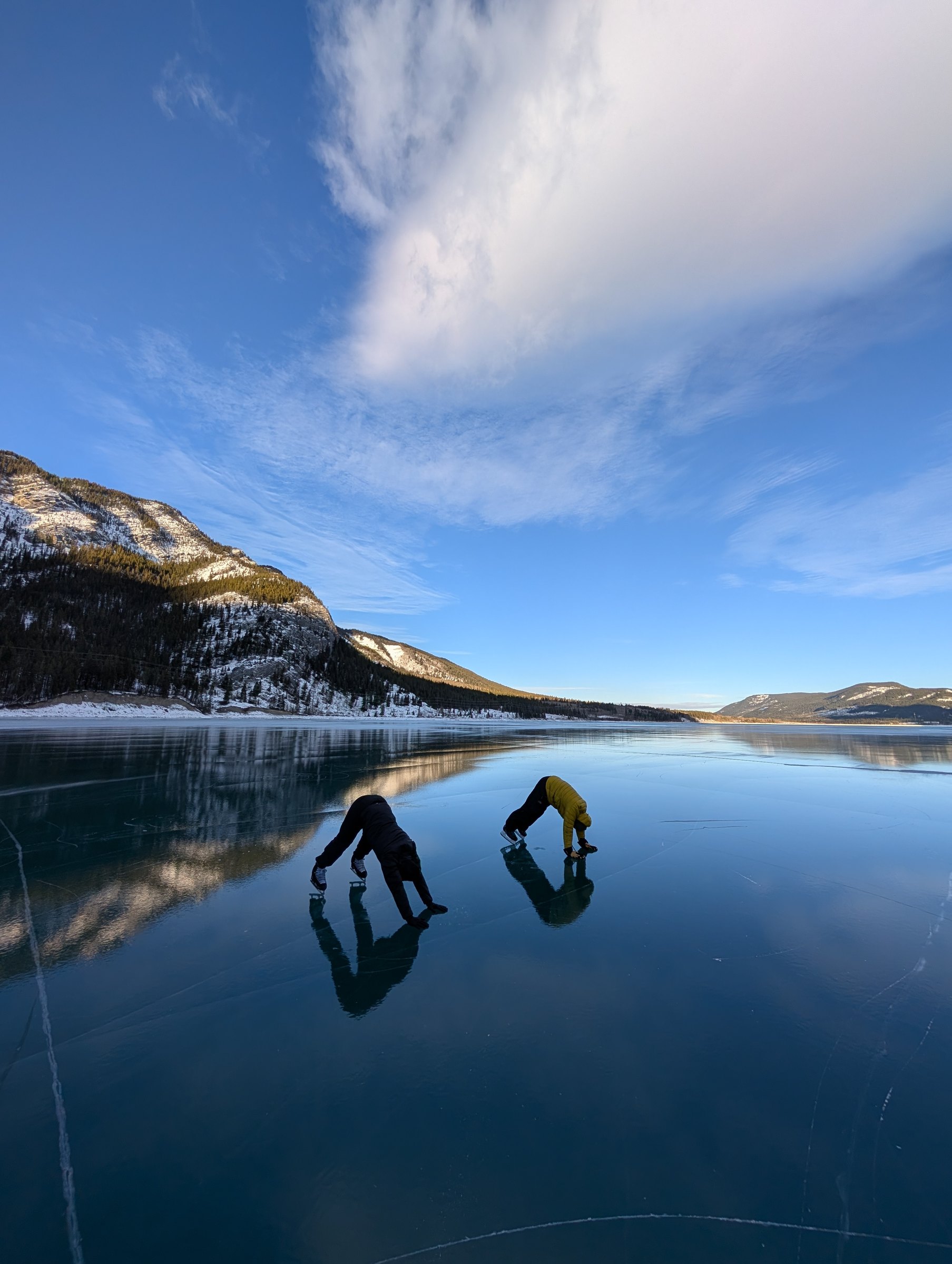 Elladj Baldé and crew on the reflective frozen lake — Wild Ice BTS