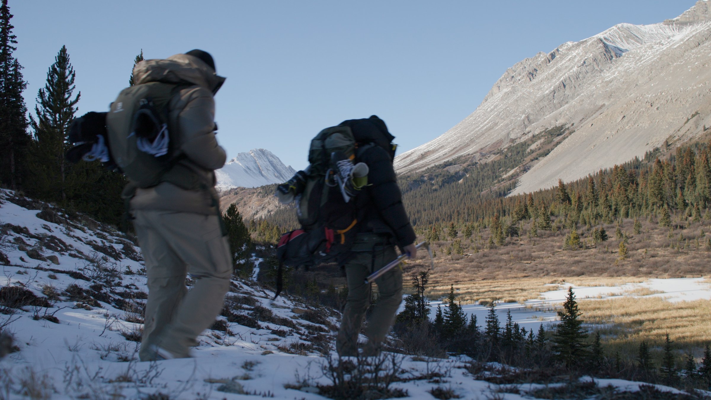 Two figures hiking — Wild Ice