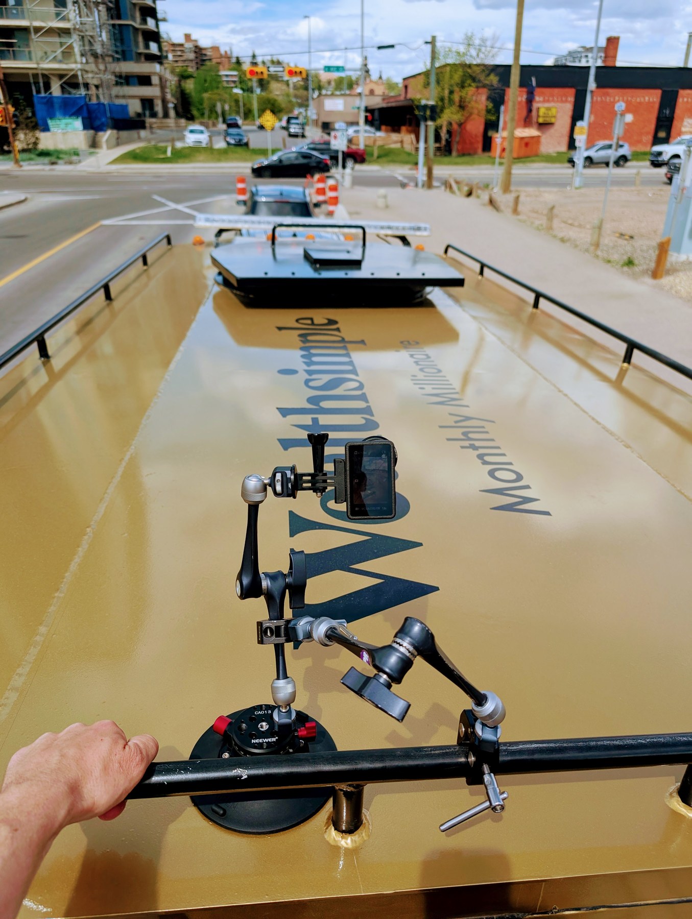DJI Action cameras rigged on roof of moving Wealthsimple armored truck — Calgary streets BTS